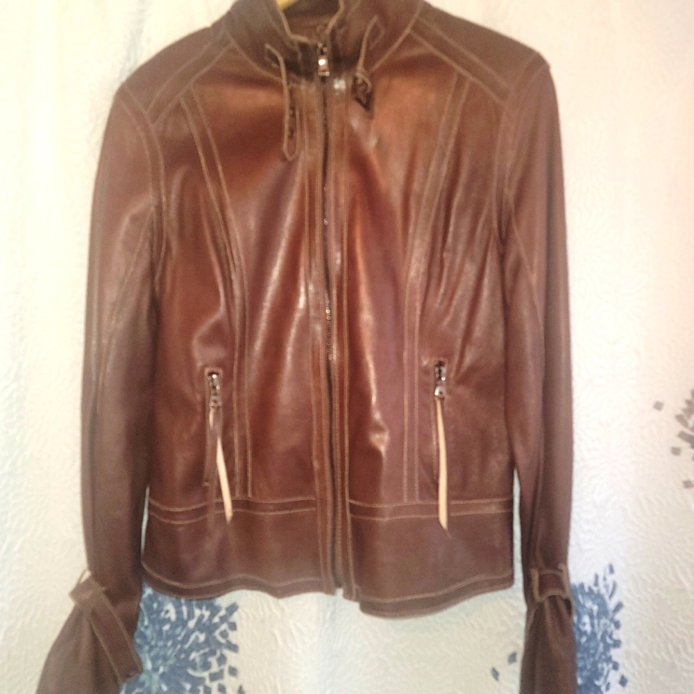 Andrew Marc chocolate brown leather jacket, with silver hardware. Size large